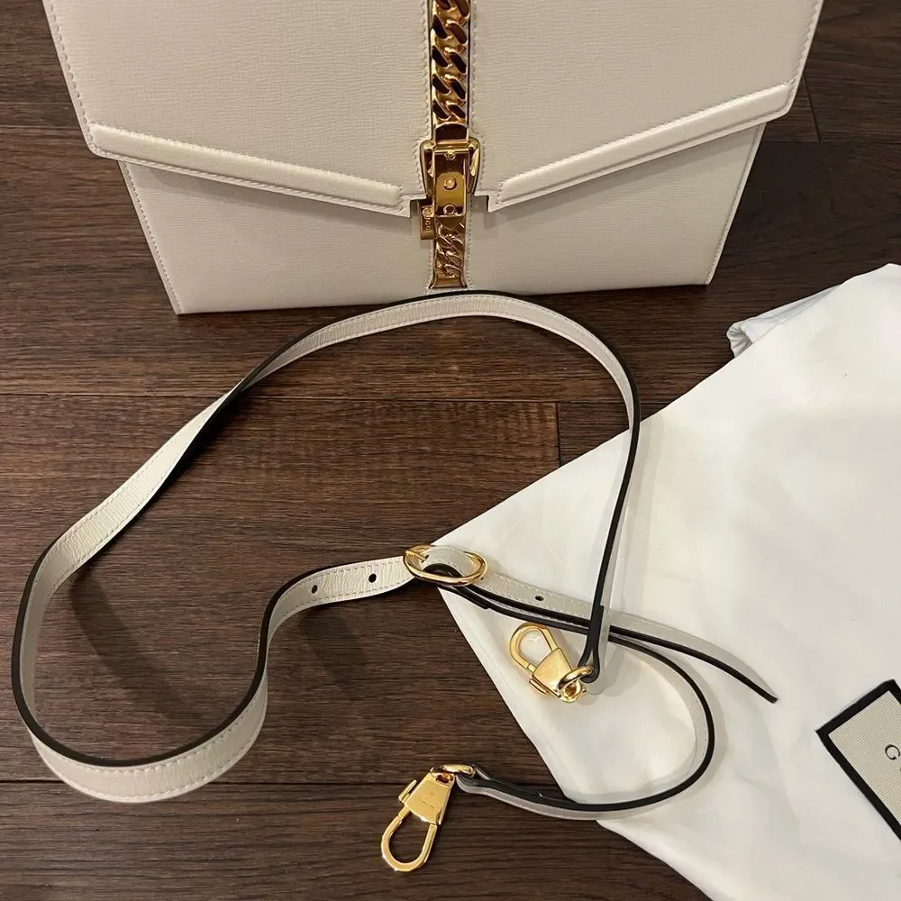 - Used once Gucci Sylvie 1969 small leather shoulder bag